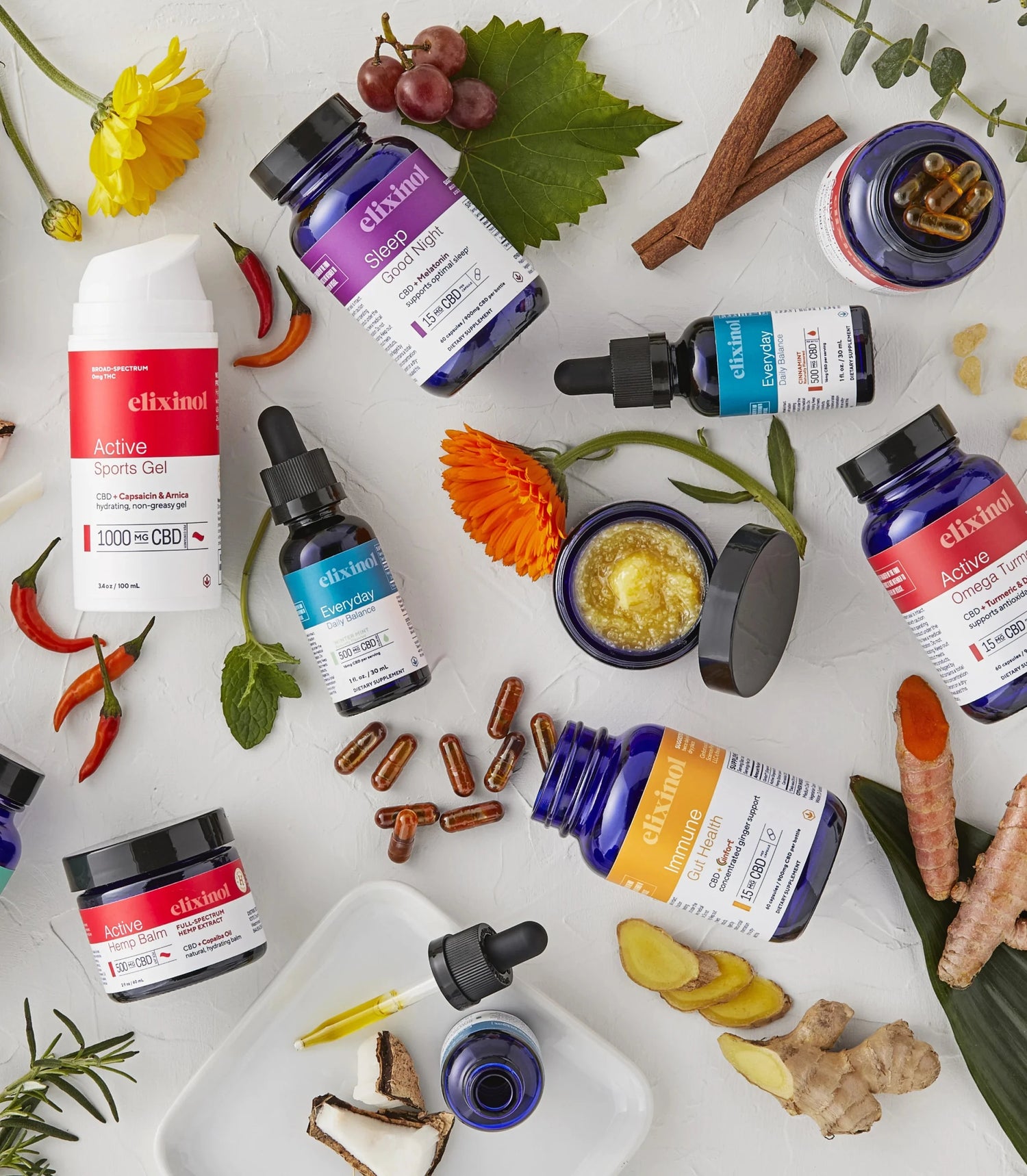 Elixinol product shots scattered on a table