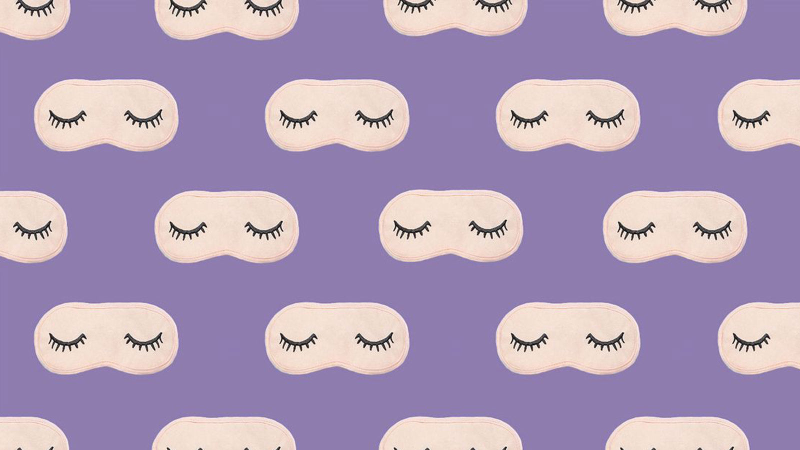 Sleeping masks with eyelashes on purple background